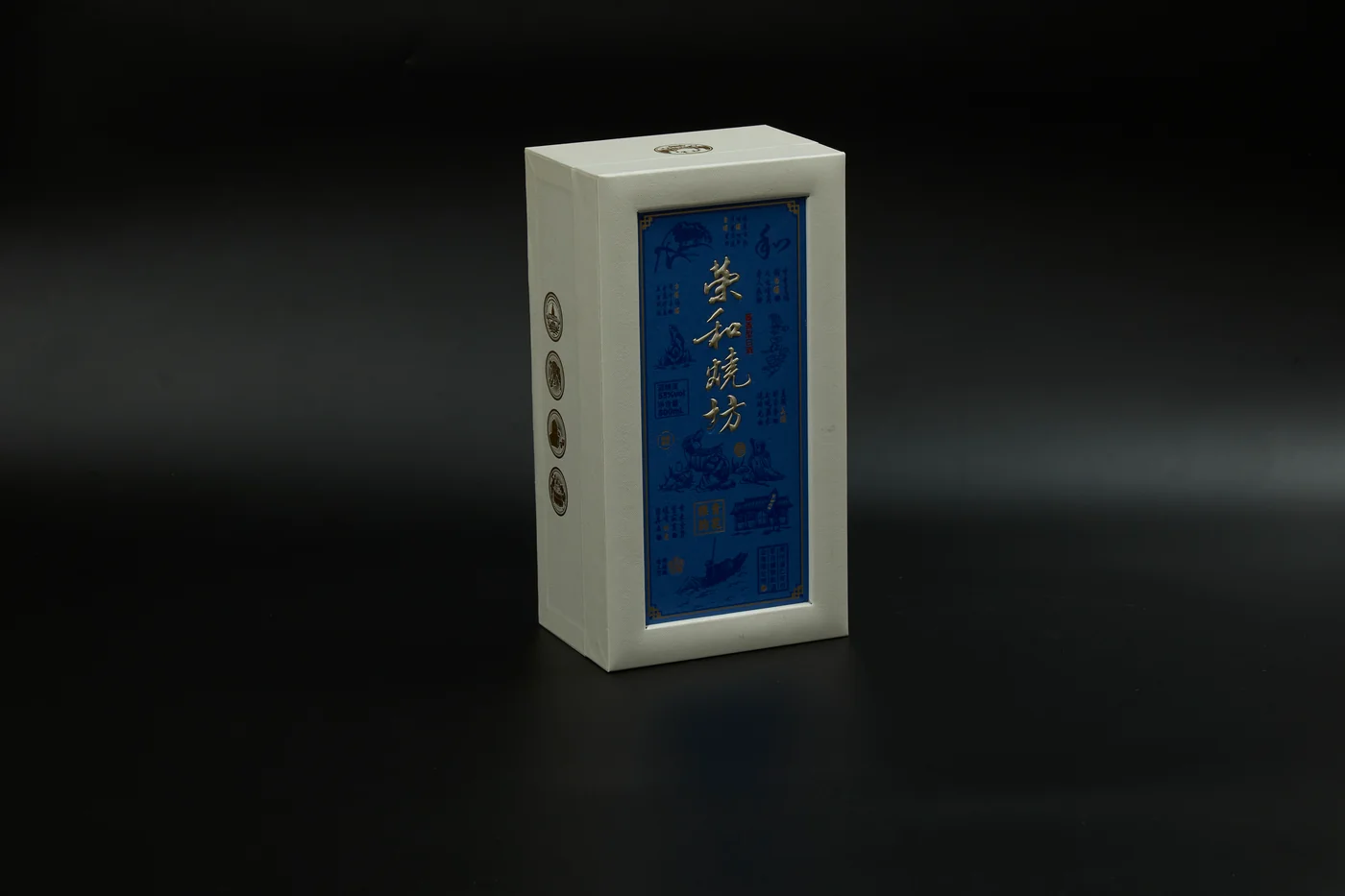 An upright cream carton with a blue printed panel