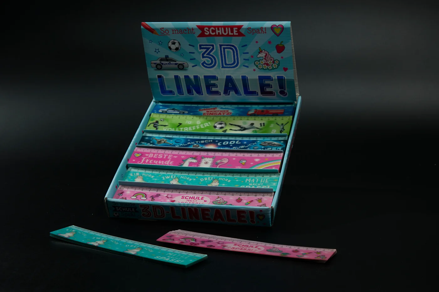 Printed rulers arranged for display